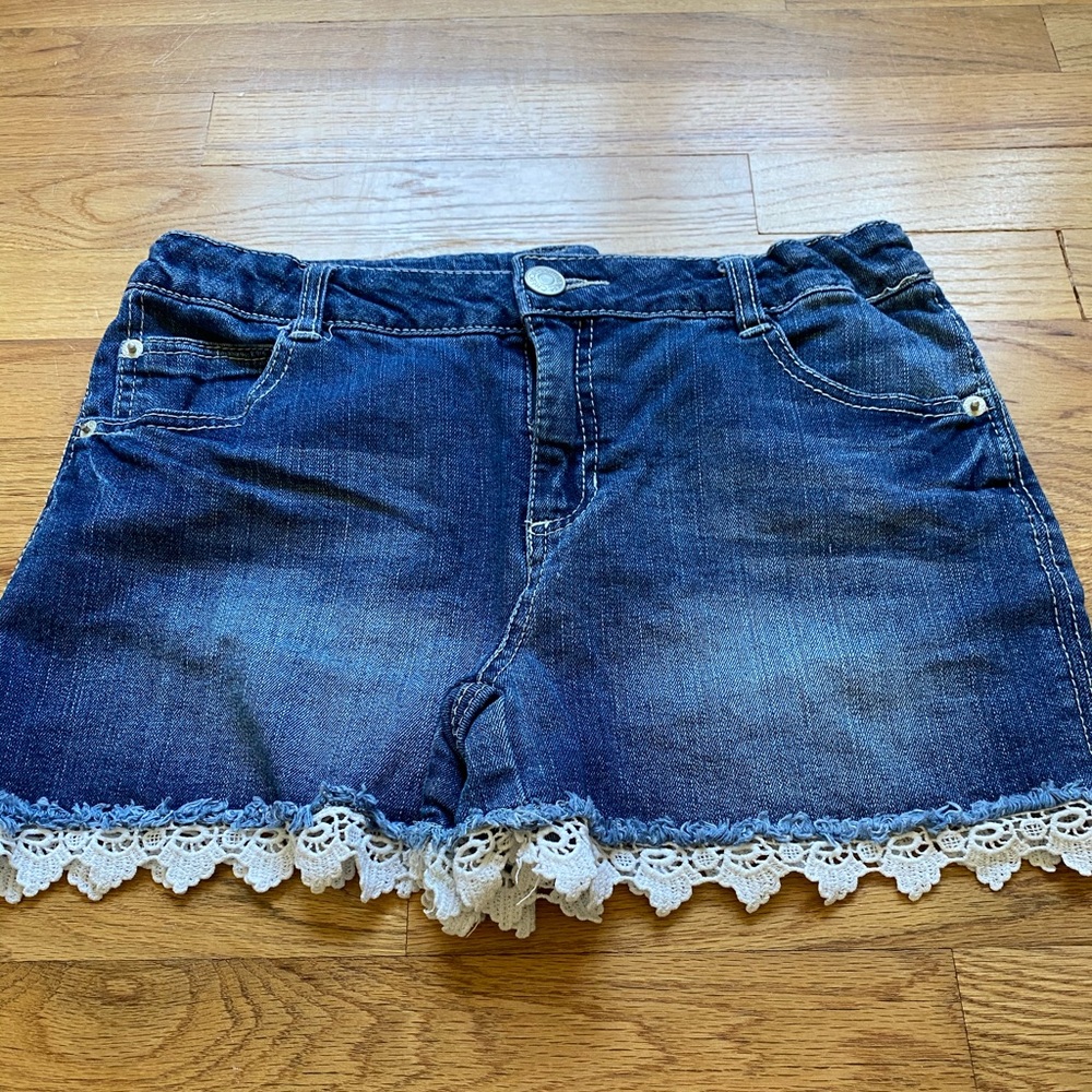Kids blue denim shorts.